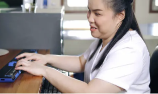 Asian woman on laptop