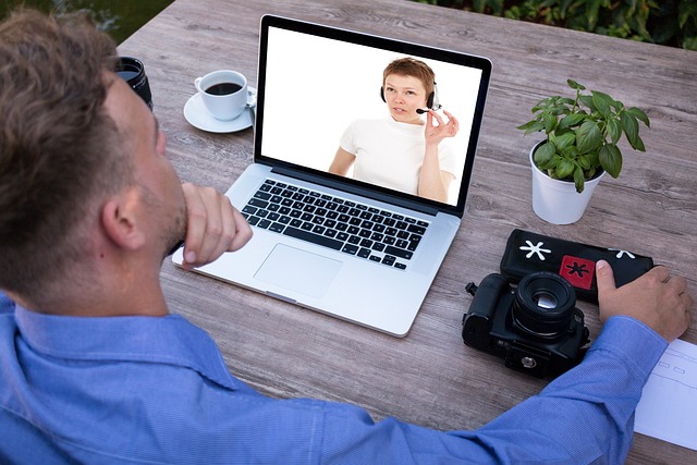 Man on video call with his laptop